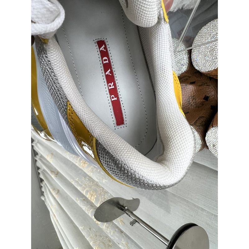 Pra*a americas cup sneakers gold/silver