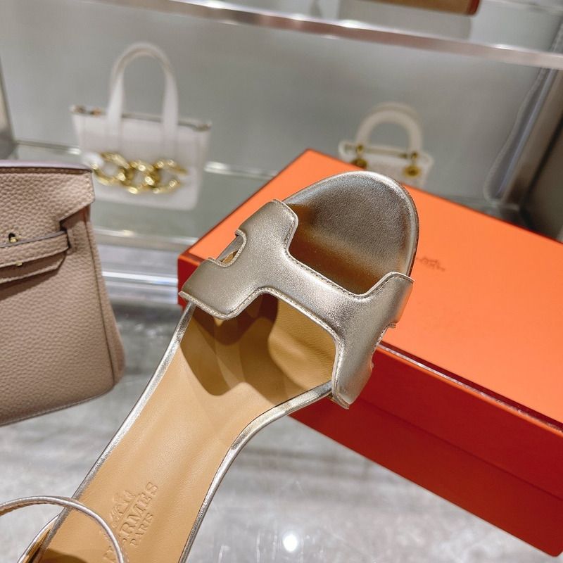 H**mes leather high heels in pale gold