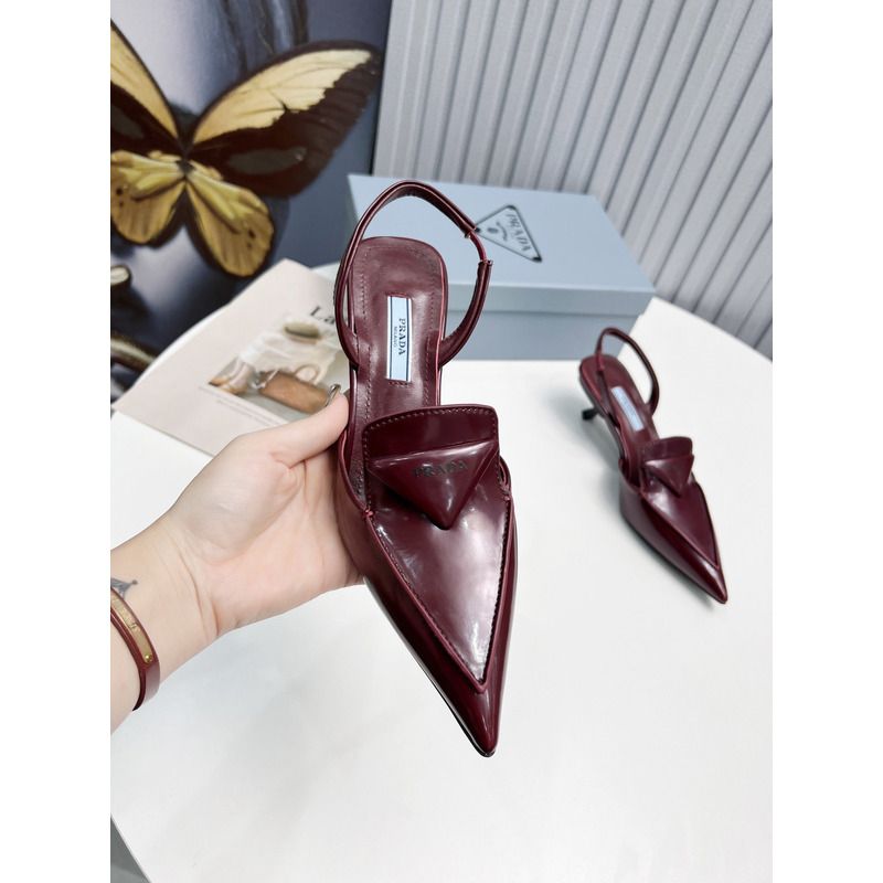 Pra*a logo patent leather pointy toe mule in wine