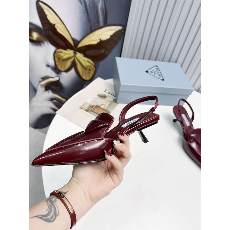 Pra*a logo patent leather pointy toe mule in wine