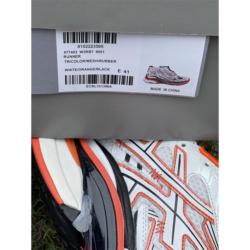 kith x Ba*len*cia*ga runner sneaker white/orange/black