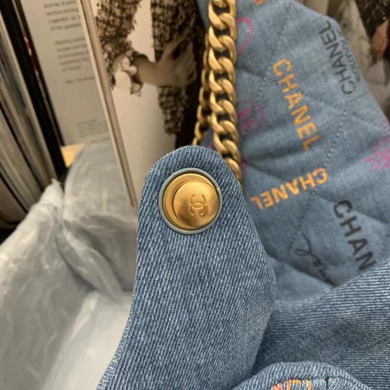 Ch*el  maxi hobo bag printed denim & gold-tone metal blue & multicolor