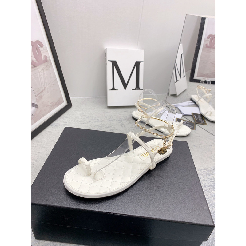 Ch*el leather quilted thong sandals white