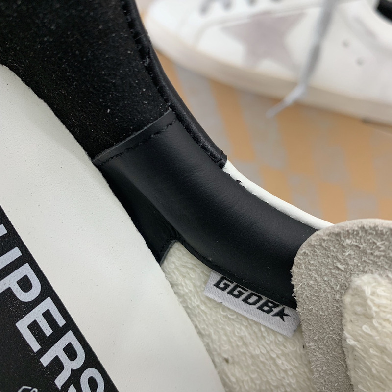 golden goose men’s S*per-star sneakers with suede star and black heel tab