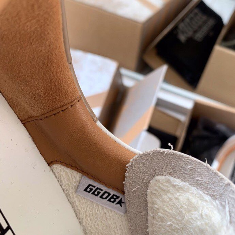 golden goose men’s S*per-star sneakers with suede star and brown heel tab