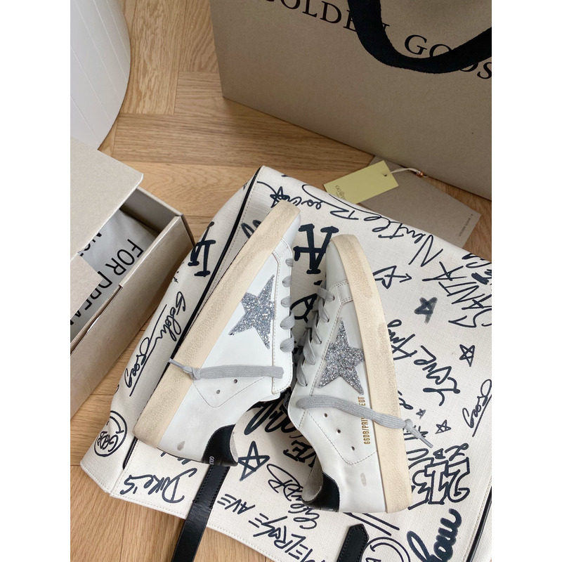 golden goose S*per-star sneakers with sliver glitter and black heel tab