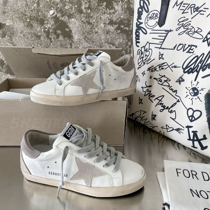 golden goose men’s S*per-star sneakers with suede star and grey heel tab