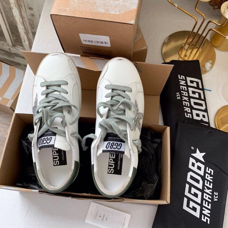 golden goose S*per-star sneakers with sliver glitter and black heel tab