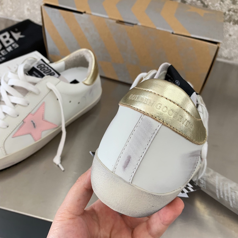 golden goose men’s S*per-star sneakers with pink star and golden heel tab
