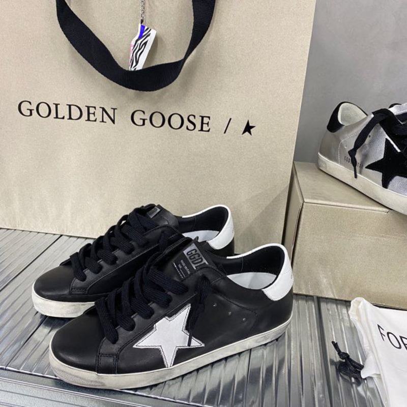 golden goose black S*per-star sneakers in leather with white star