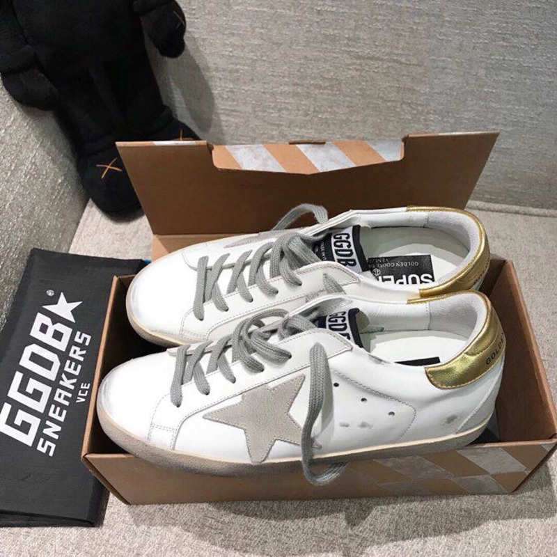 golden goose men’s S*per-star sneakers with suede star and golden heel tab