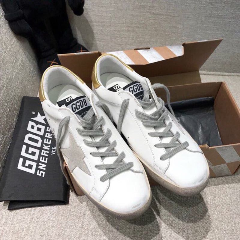 golden goose men’s S*per-star sneakers with suede star and golden heel tab