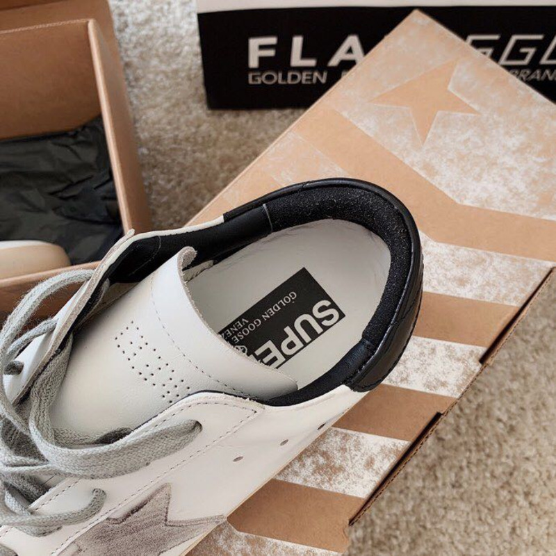 golden goose men’s S*per-star sneakers with suede star and black heel tab