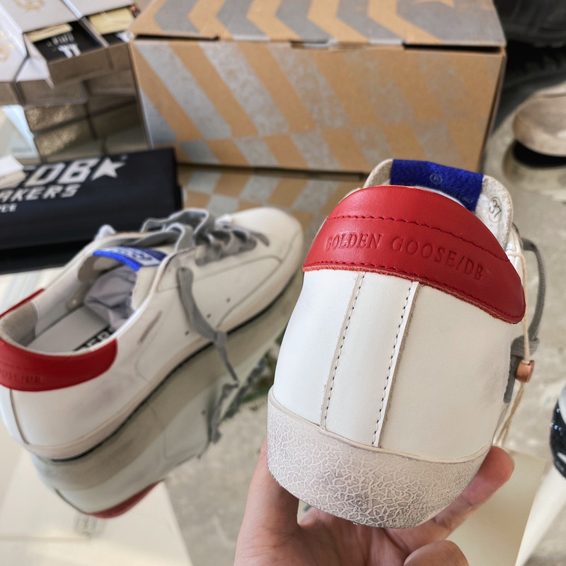 golden goose S*per-star sneakers with blue glitter and red heel tab