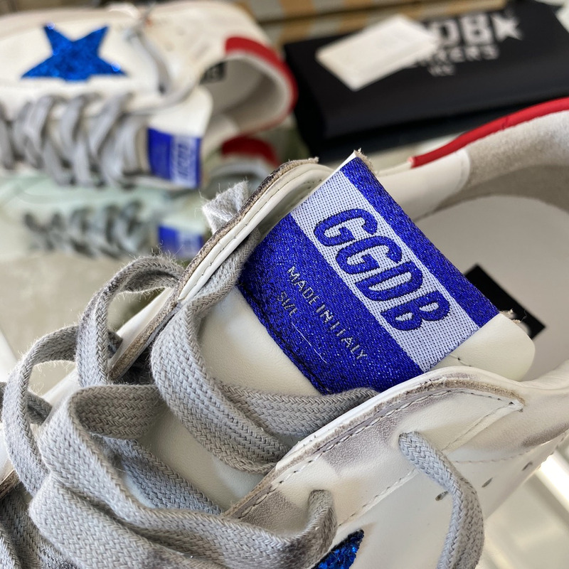 golden goose S*per-star sneakers with blue glitter and red heel tab