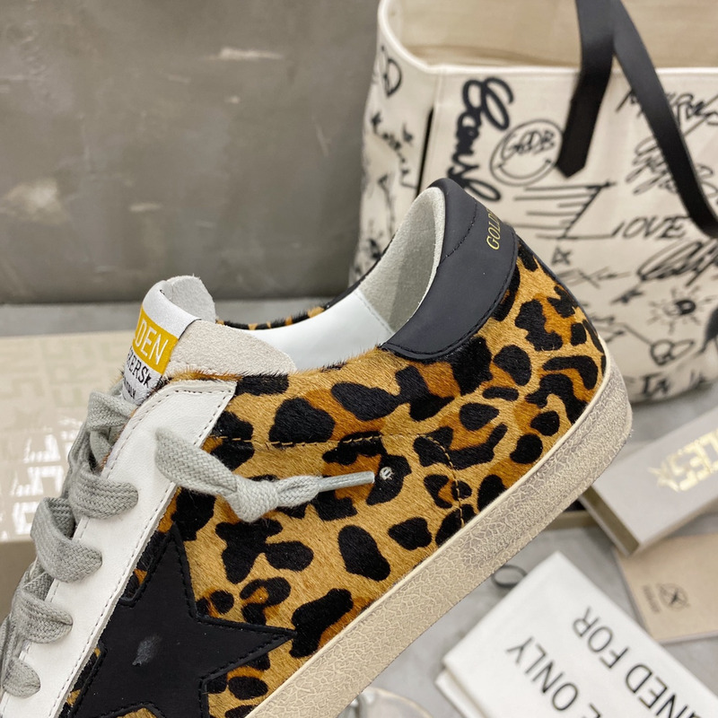golden goose S*per-star sneakers with leopard print and black heel tab