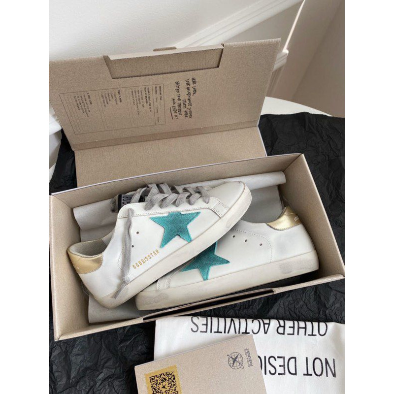 golden goose S*per-star sneakers with green and yellow suede star and golden heel tab