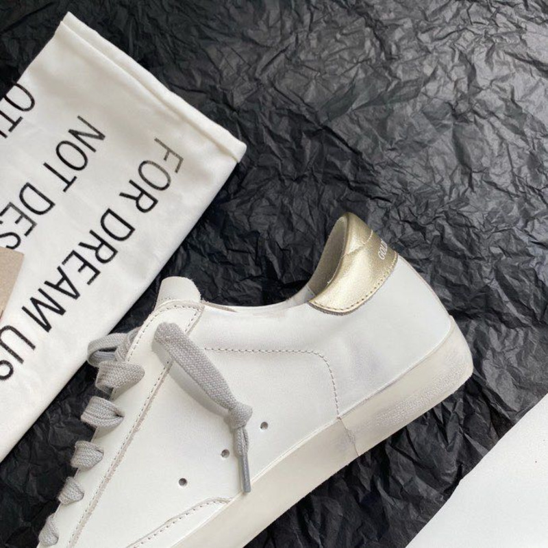 golden goose S*per-star sneakers with green and yellow suede star and golden heel tab