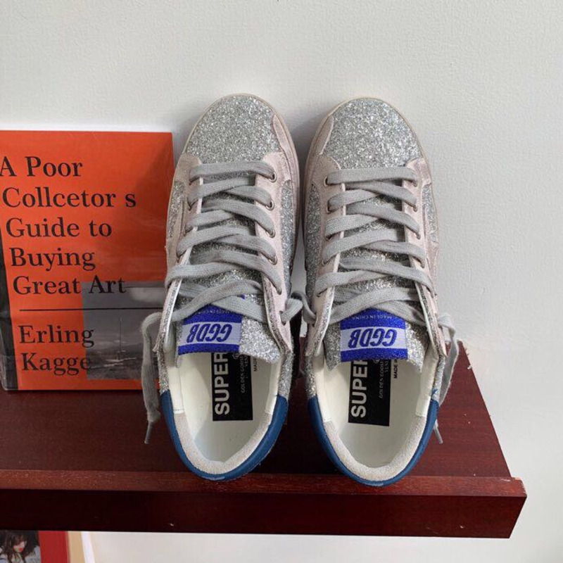 golden goose S*per-star sneakers with sliver glitter and blue heel tab