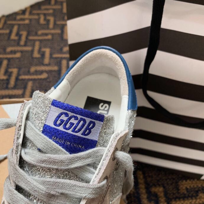 golden goose S*per-star sneakers with sliver glitter and blue heel tab