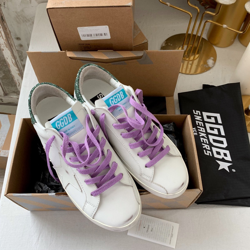 golden goose S*per-star sneakers with star and green glitter heel tab