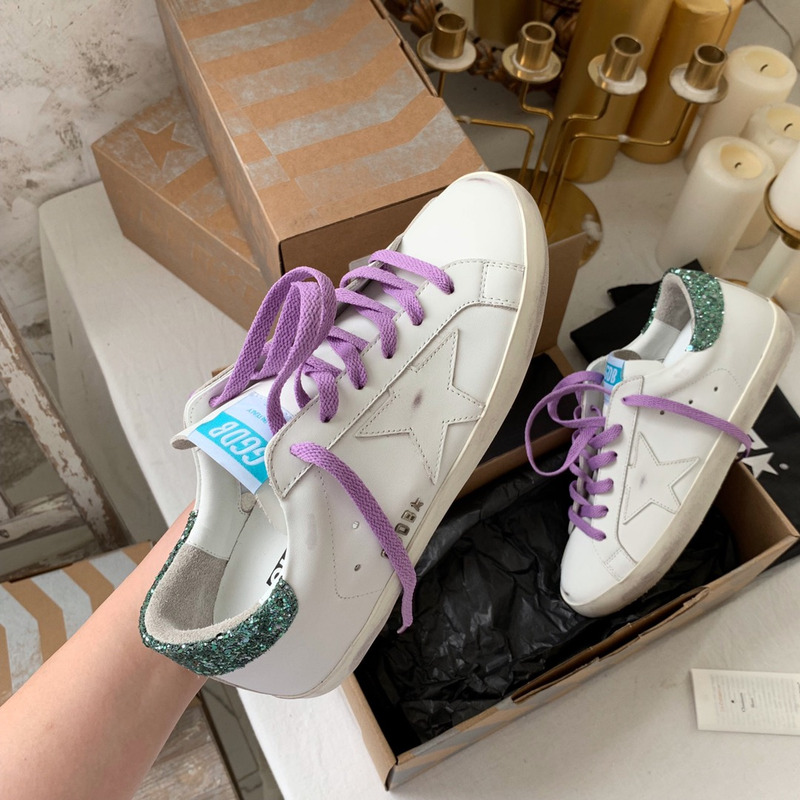 golden goose S*per-star sneakers with star and green glitter heel tab