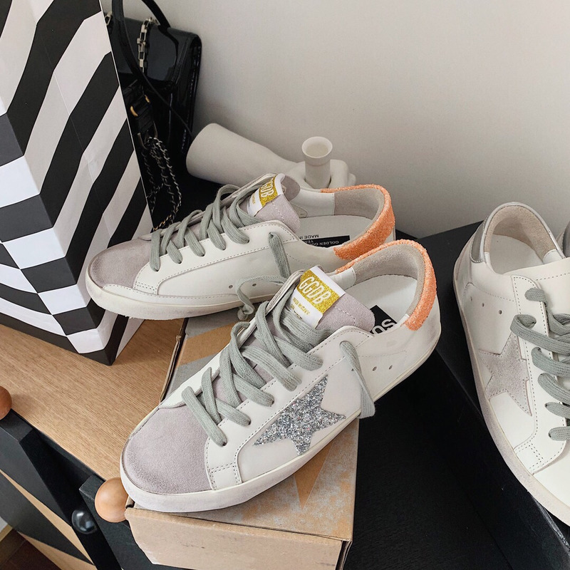 golden goose S*per-star sneakers with sliver glitter and orange heel tab