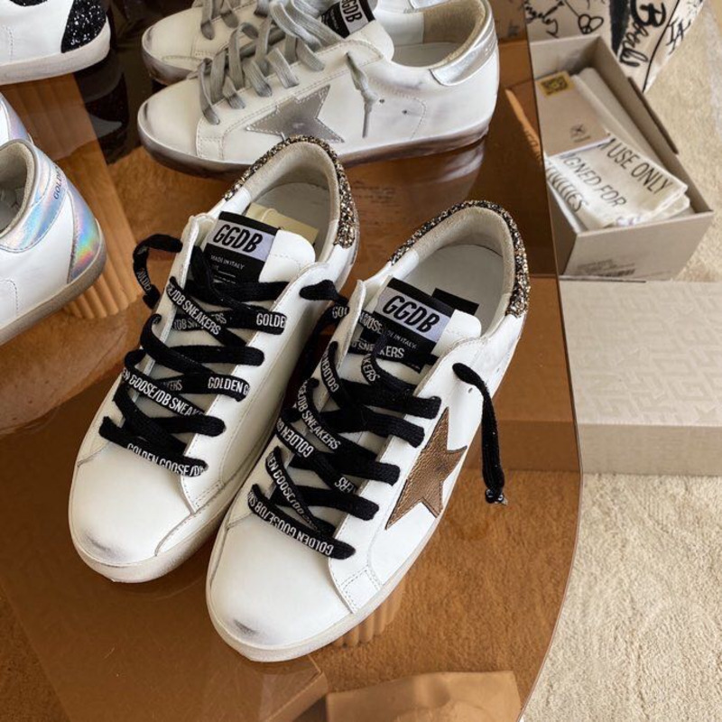 golden goose men’s S*per-star sneakers with brown suede star and glitter heel tab