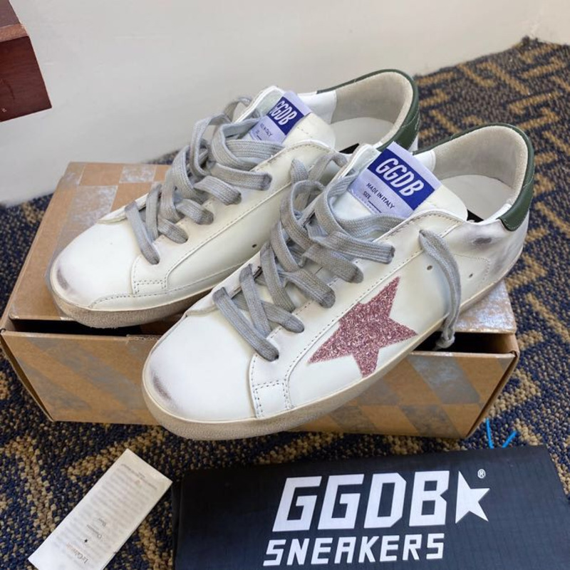 golden goose men’s S*per-star sneakers with pink glitter star and green heel tab