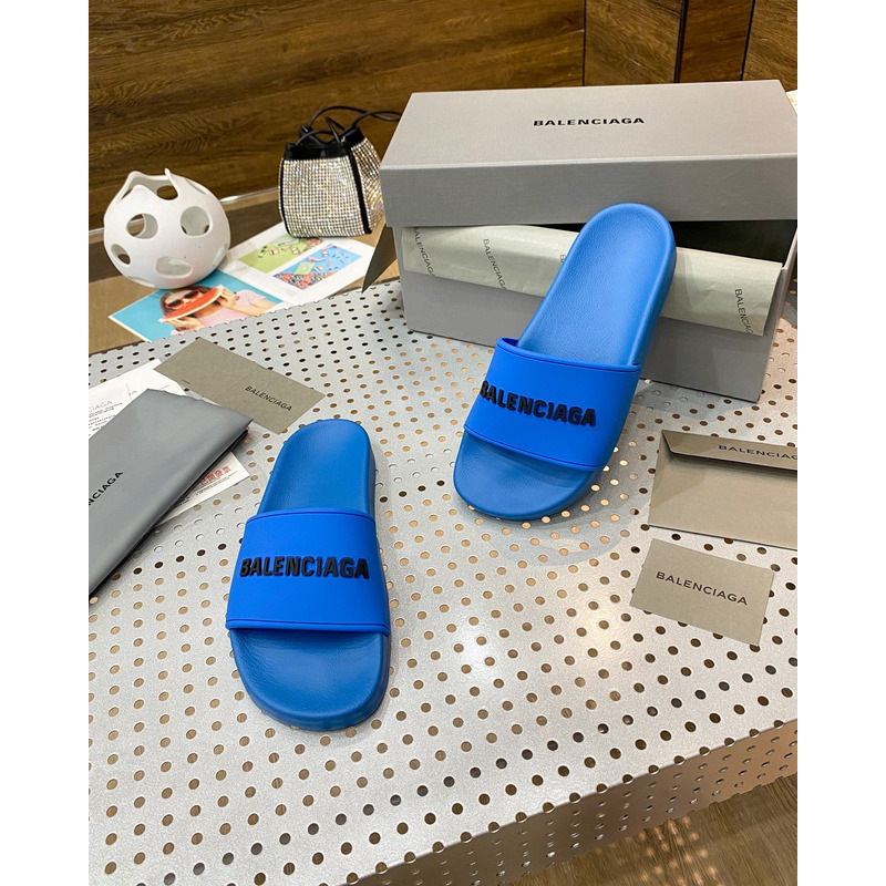 Ba*len*cia*ga pool slide sandal in blue smooth rubber with black 3d Ba*len*cia*ga logo