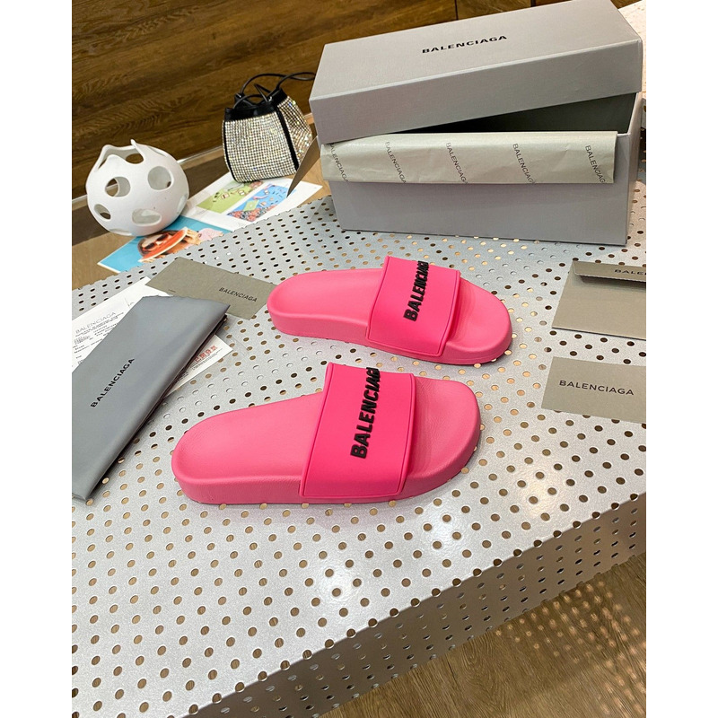 Ba*len*cia*ga piscini logo-embossed rubber sliders in fuchsia