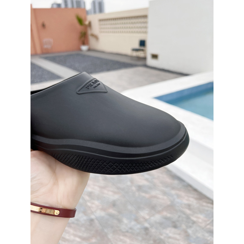 Pra*a foam rubber mules slides black