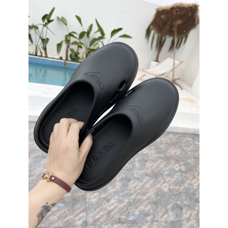 Pra*a foam rubber mules slides black