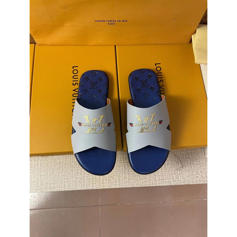 l**is V*t*n gold logo mules grey/blue