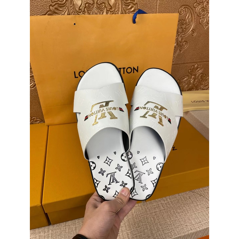l**is V*t*n gold logo mules white