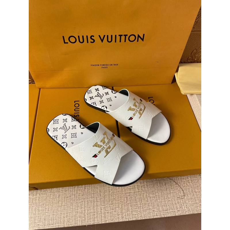 l**is V*t*n gold logo mules white