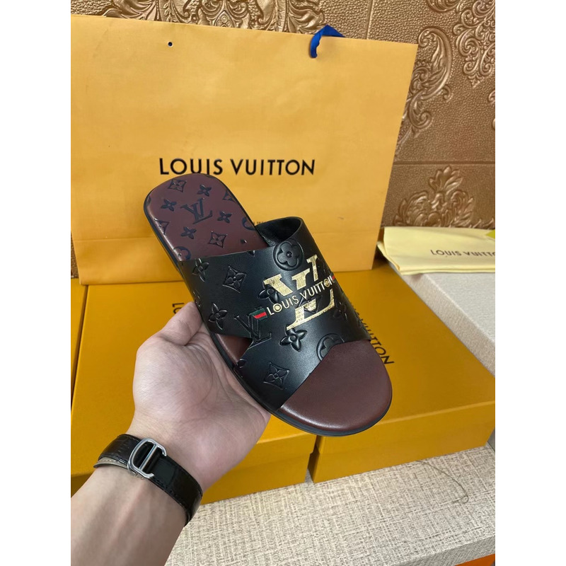 l**is V*t*n gold logo embossed monogram mules black/brown