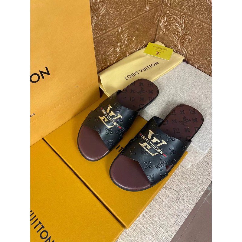 l**is V*t*n gold logo embossed monogram mules black/brown