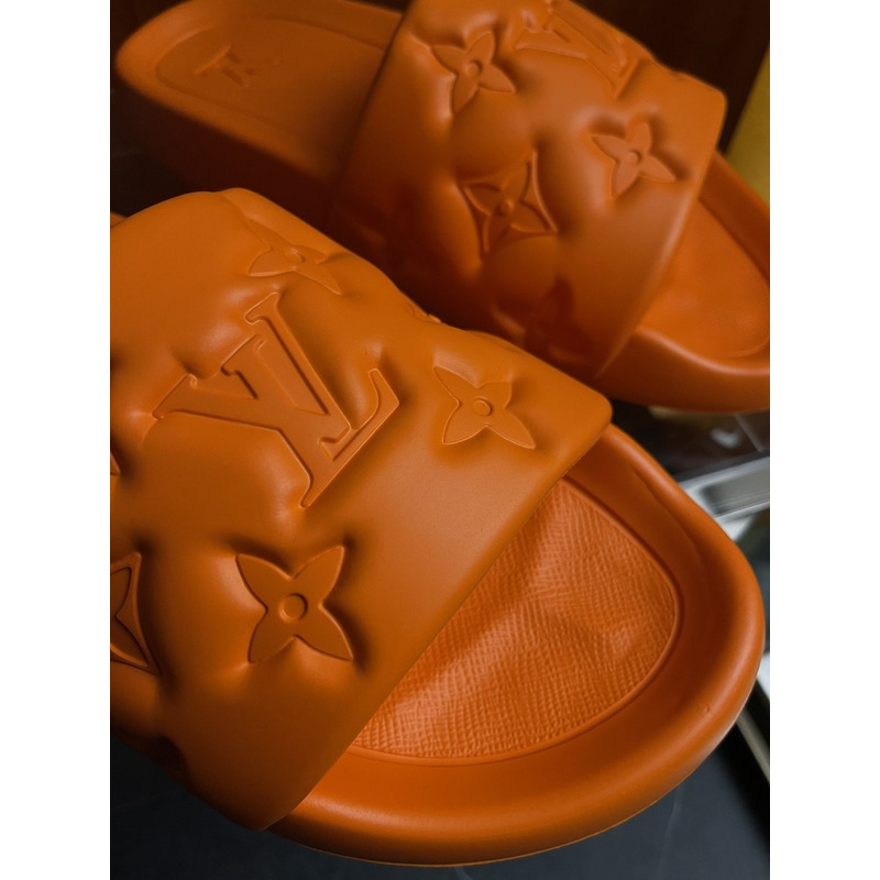 l**is V*t*n’s puffy waterfront mule orange