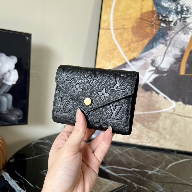 LV Embossed Zoe Short Wallet Leather Black