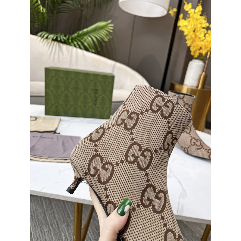 g*u*i x Ba*len*cia*ga collaboration ankle boots in brown