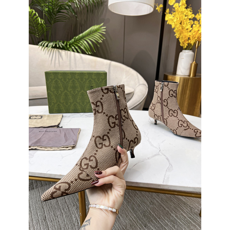 g*u*i x Ba*len*cia*ga collaboration ankle boots in brown
