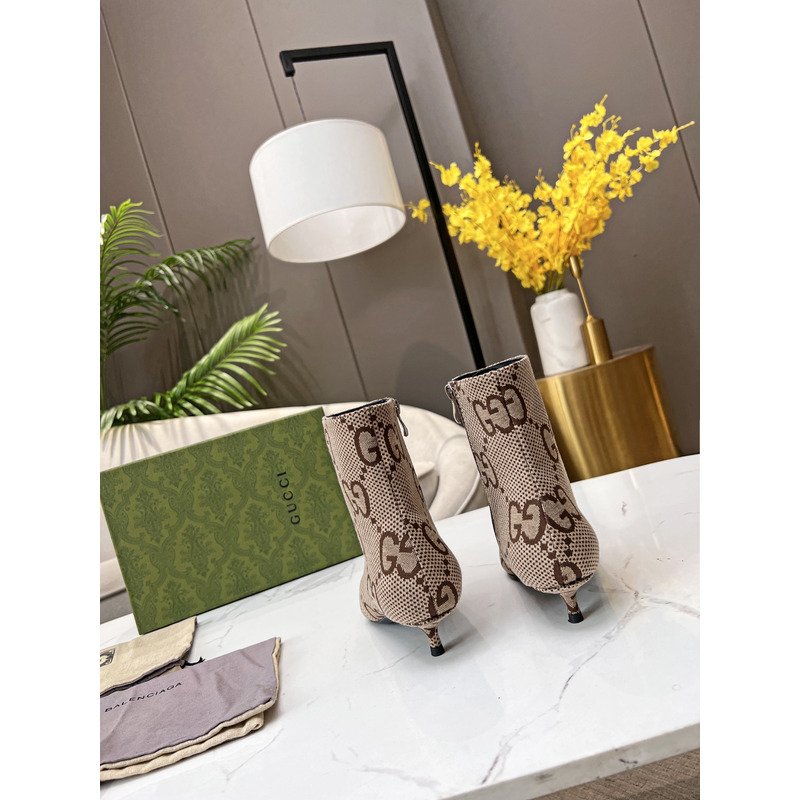 g*u*i x Ba*len*cia*ga collaboration ankle boots in brown