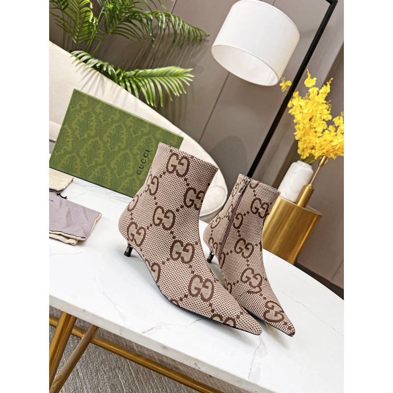 g*u*i x Ba*len*cia*ga collaboration ankle boots in brown