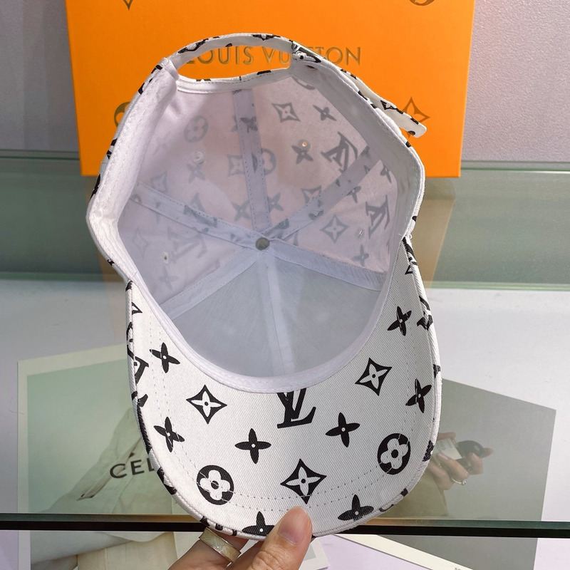 l**is V*t*n embroidered logo hat white