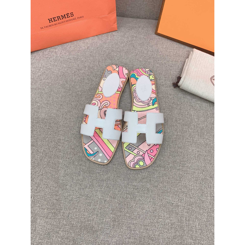 H**mes oran flat sandals in white