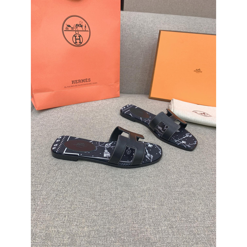 H**mes oran flat sandals in black