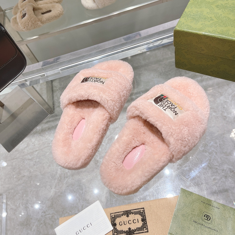 g*u*i x the n0*h F**e shearling slides light pink