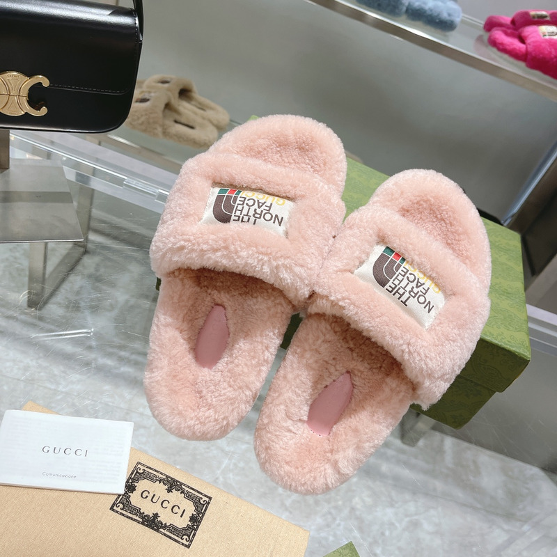g*u*i x the n0*h F**e shearling slides light pink