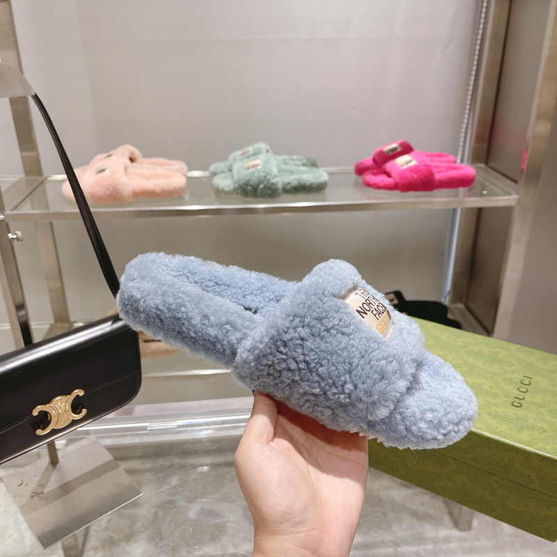 g*u*i x the n0*h F**e shearling slides blue